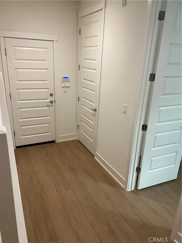 a view of walk in closet with stairs