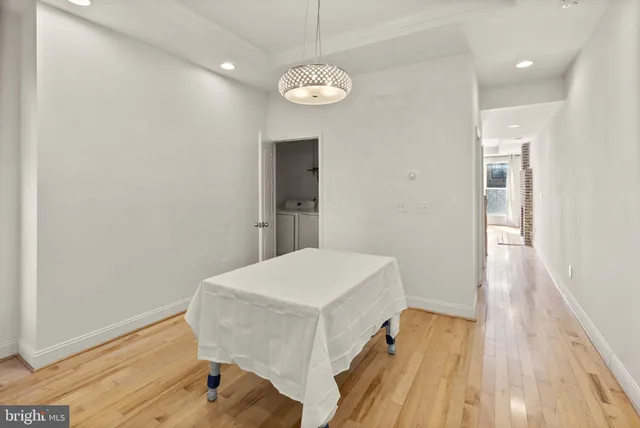 a very nice looking room with wooden floor