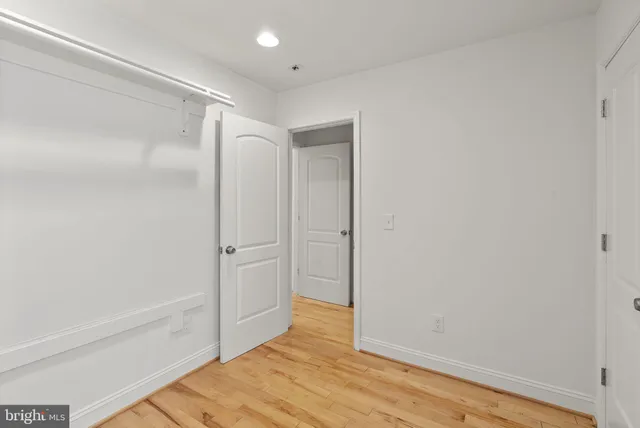 a bathroom with a tub and shower