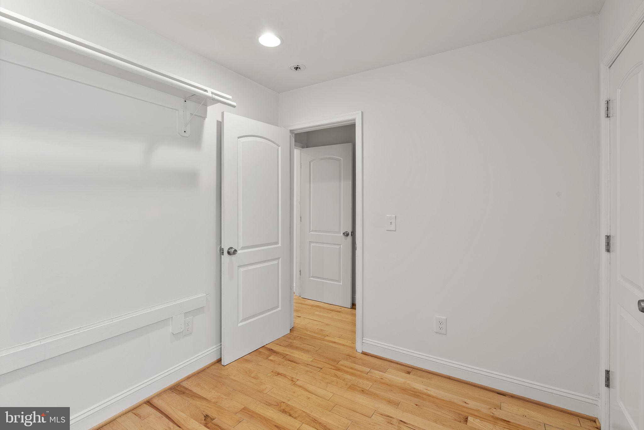 722 Lennox Street Baltimore, MD 21217 - Photo 28 of 52 a bathroom with a tub and shower