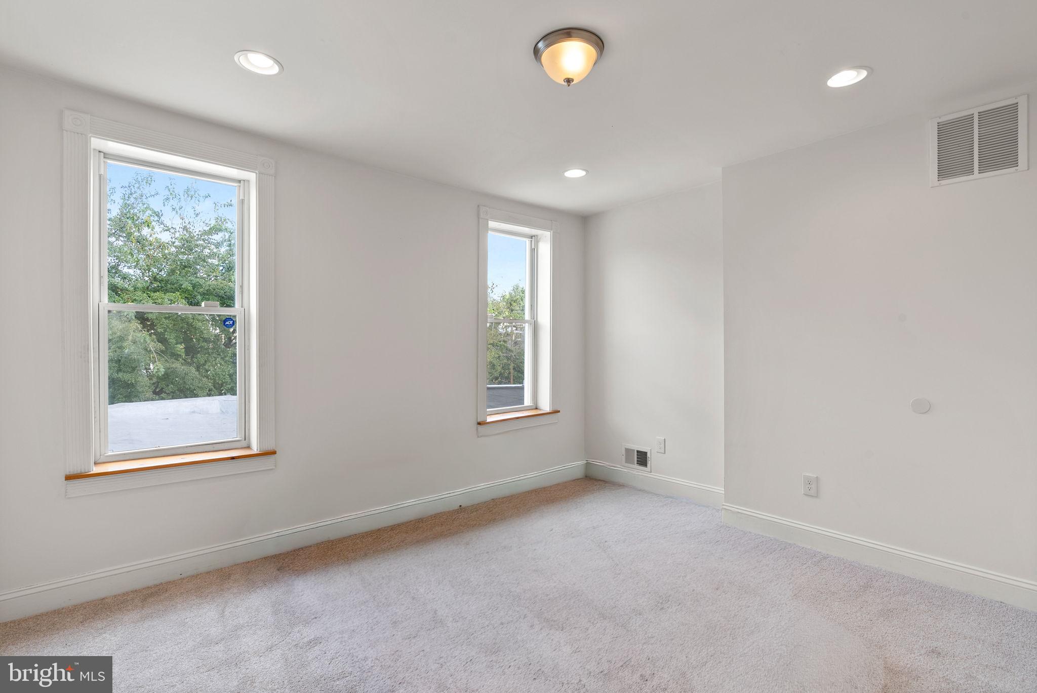 722 Lennox Street Baltimore, MD 21217 - Photo 38 of 52 an empty room with windows