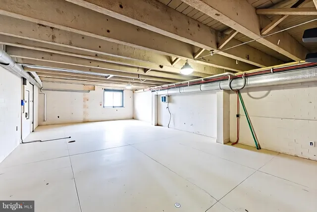 a picture of a room with a floor to ceiling window