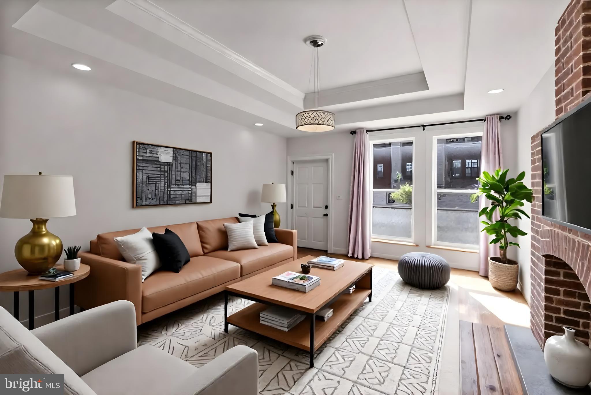 722 Lennox Street Baltimore, MD 21217 - Photo 9 of 52 a living room with furniture and a potted plant