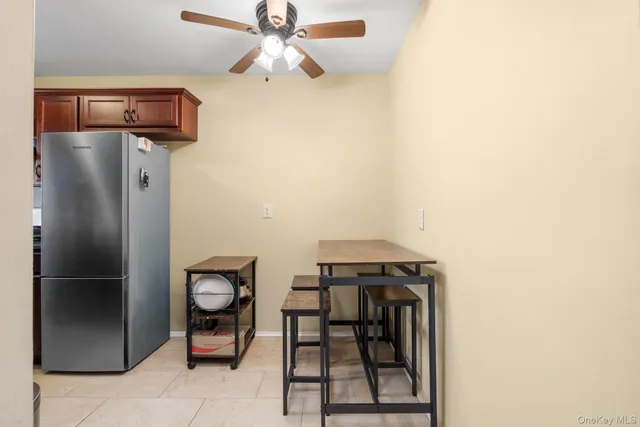 a view of a hallway with seating area