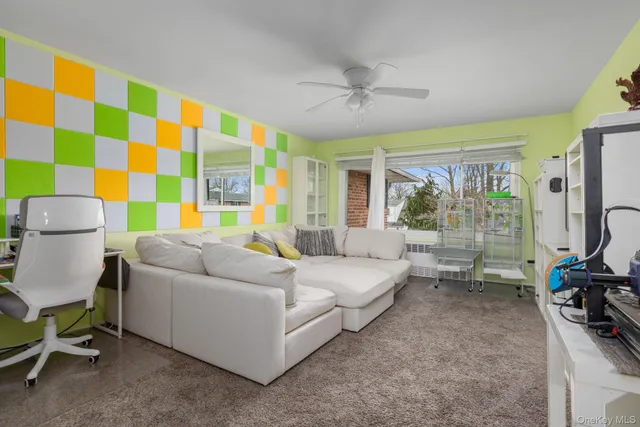 a bed room with a bed and a chair