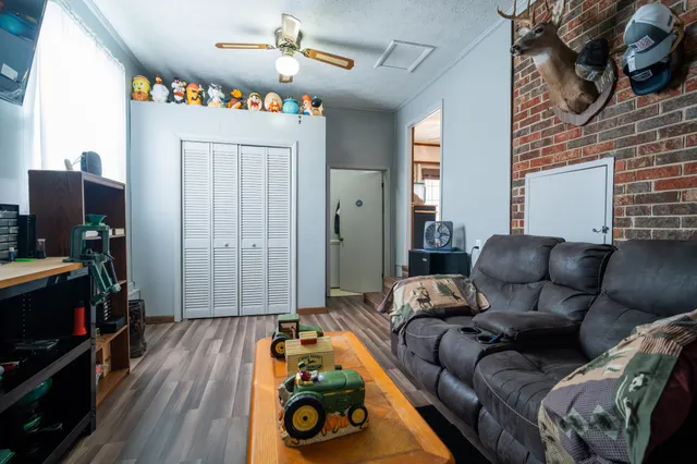 a dining room with furniture and window