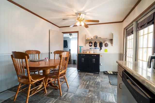 a vase of flowers sitting on a table
