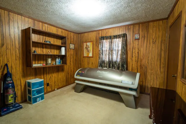 a spacious bathroom with a double vanity sink a mirror and a bathtub