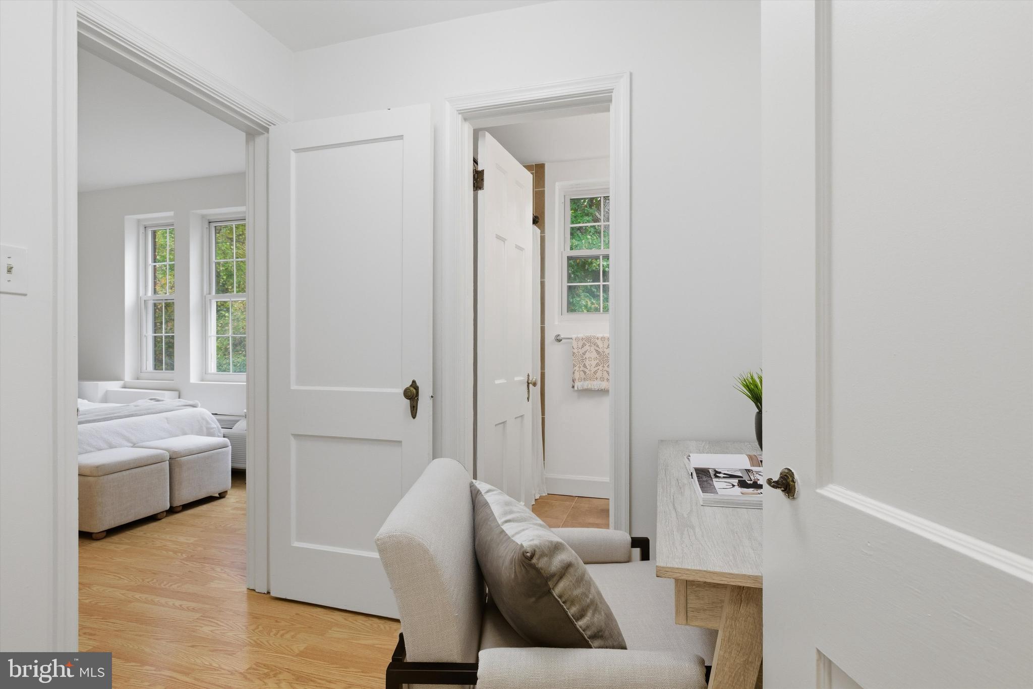 1909 North Rhodes Street, Unit 25 Arlington, VA 22201 - Photo 12 of 16 a living room with furniture and a gate