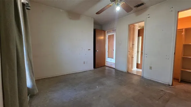 a bathroom with a sink a toilet and a shower