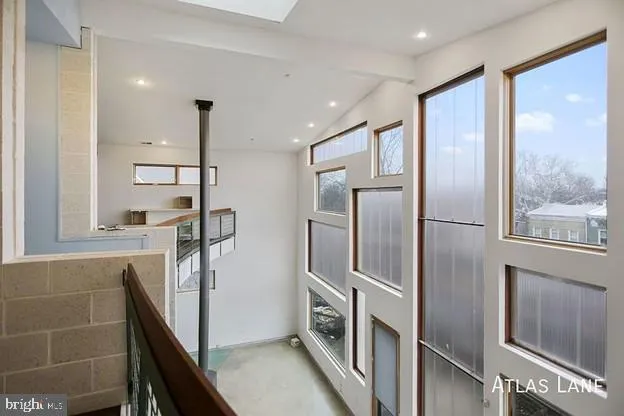 a kitchen with stainless steel appliances a refrigerator and a counter top space