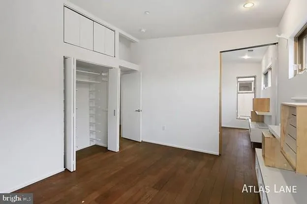 a view of livingroom with furniture and wooden floor