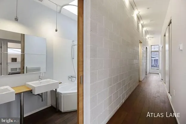 a view of a storage & utility room with washer and dryer