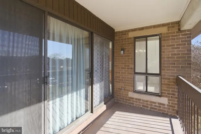 a view of a balcony with a door
