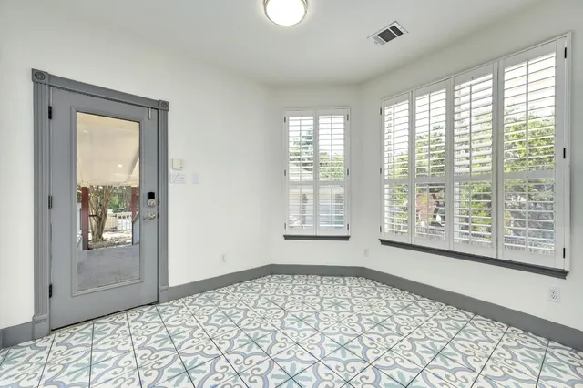 a big room with windows and closet