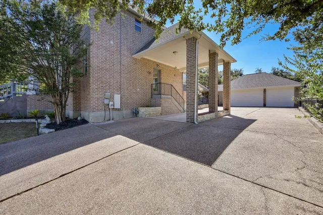 a spacious bathroom with a sink and a yard
