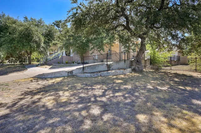 a backyard of a house with lots of green space