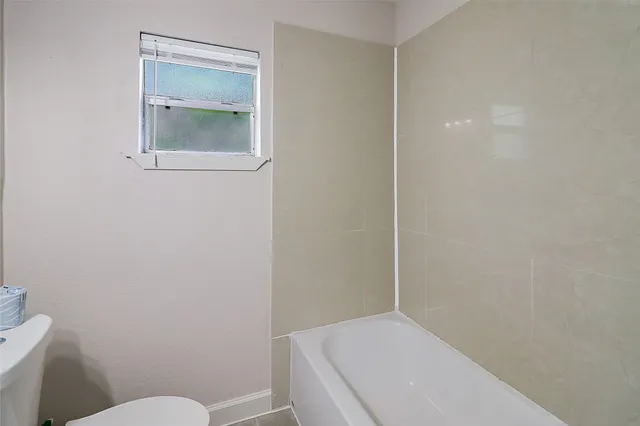 a bathroom with a toilet