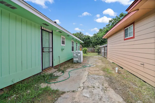 a view of a backyard with a garden