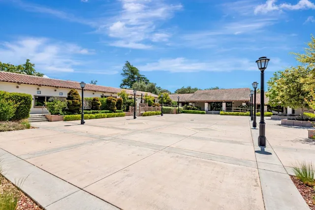 a view of a street with a building in the background