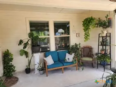 a building outdoor space with patio furniture