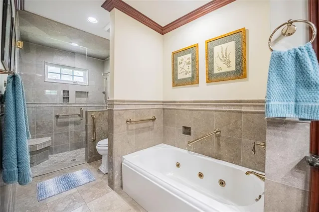a living room with furniture wooden floor and a table