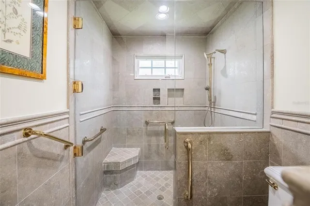 a bed room with a bed and furniture