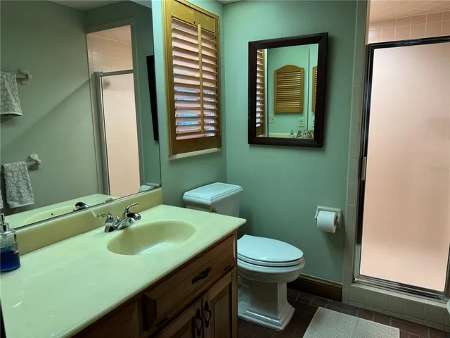 a view of a porch with furniture window and a chandelier