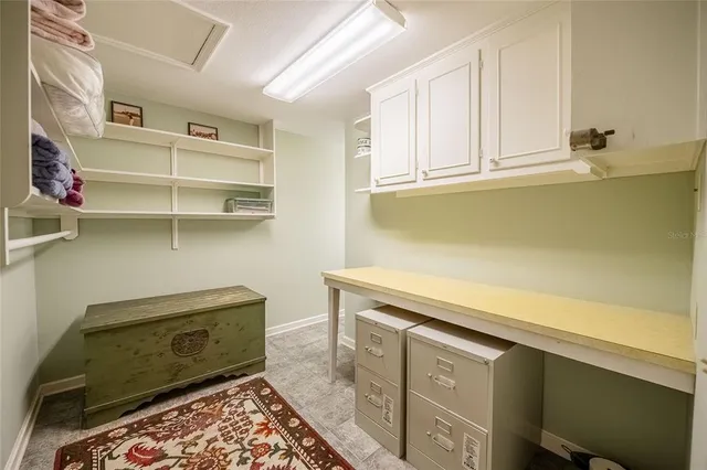 an aerial view of a houses with outdoor space and lake view