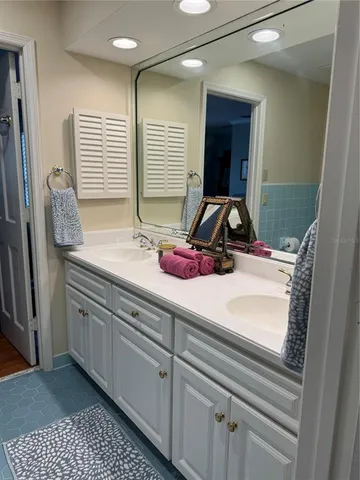 a view of a house with a flower garden