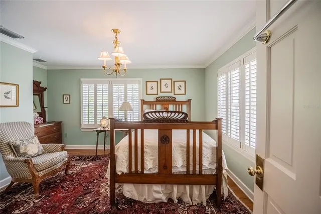 an aerial view of a house with a balcony