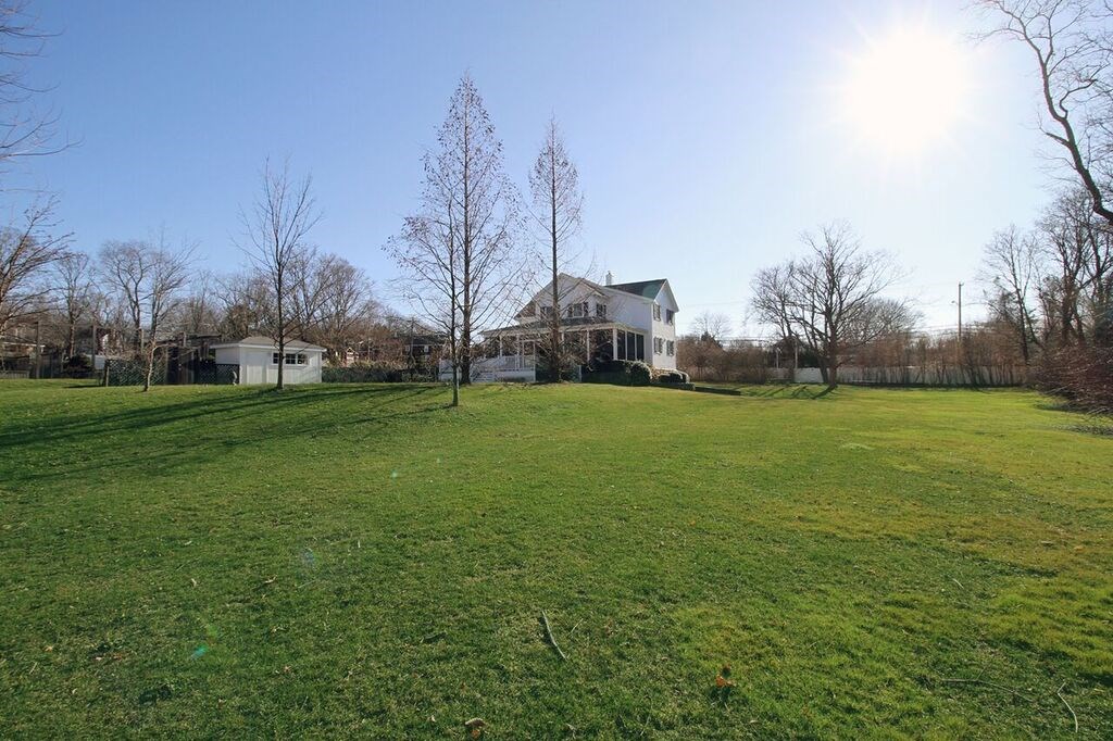 515 West Main Road Portsmouth, RI 02871 - Photo 40 of 50 Lovely backyard gardens and pool house.