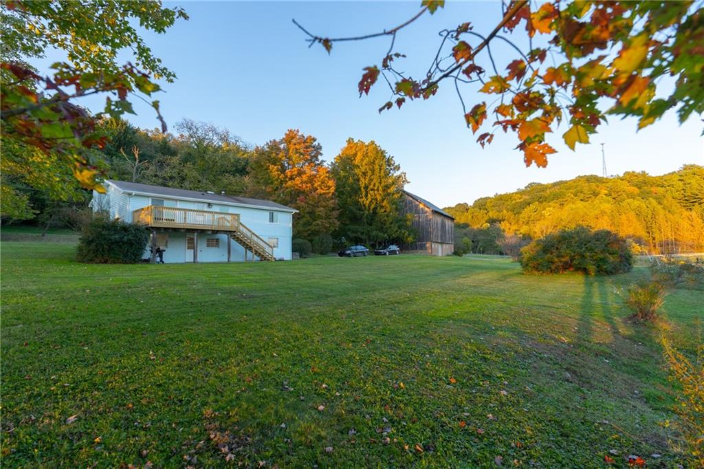 338 Glen Eden Road Rochester, PA 15074 - Photo 3 of 23 a view of a big yard with a house