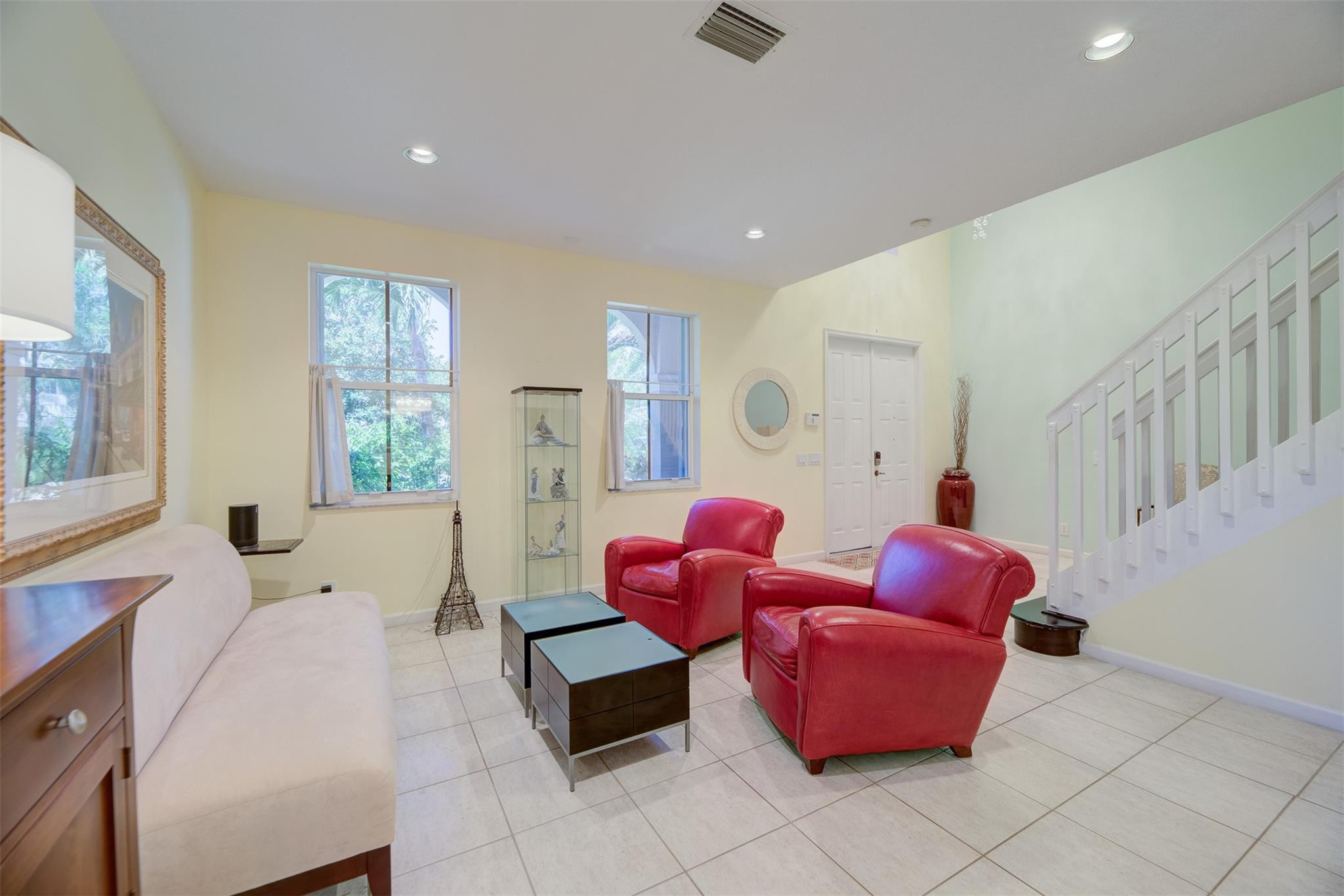 4452 Stone Ridge Way Weston, FL 33331 - Photo 22 of 65 a living room with furniture and a large window