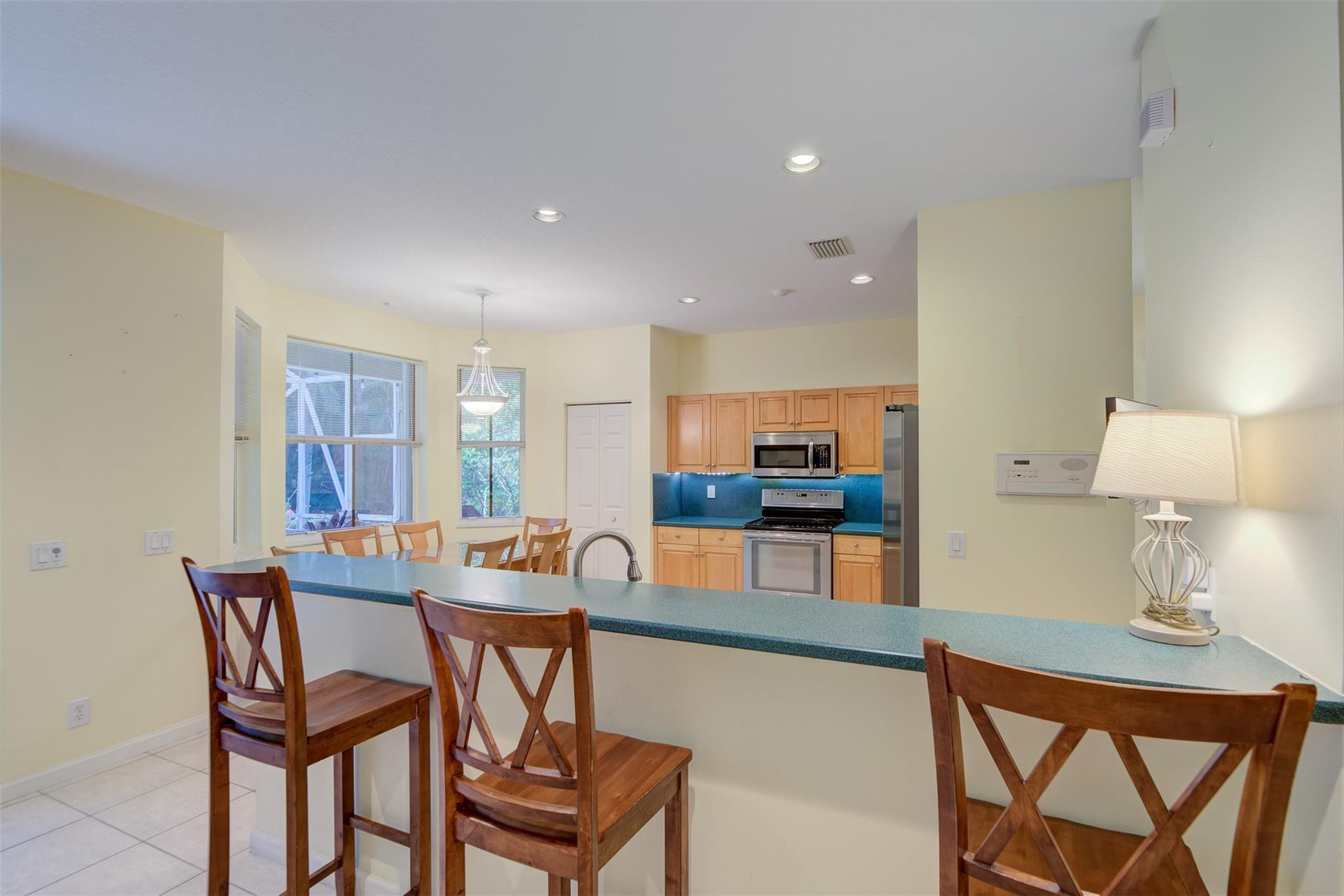 4452 Stone Ridge Way Weston, FL 33331 - Photo 28 of 65 a dining room with furniture and window