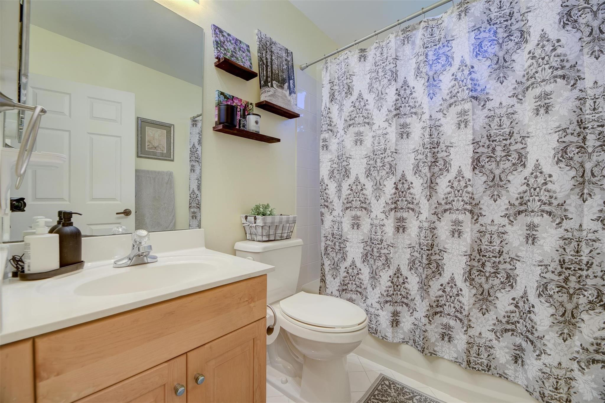 4452 Stone Ridge Way Weston, FL 33331 - Photo 35 of 65 a bathroom with a sink toilet and shower