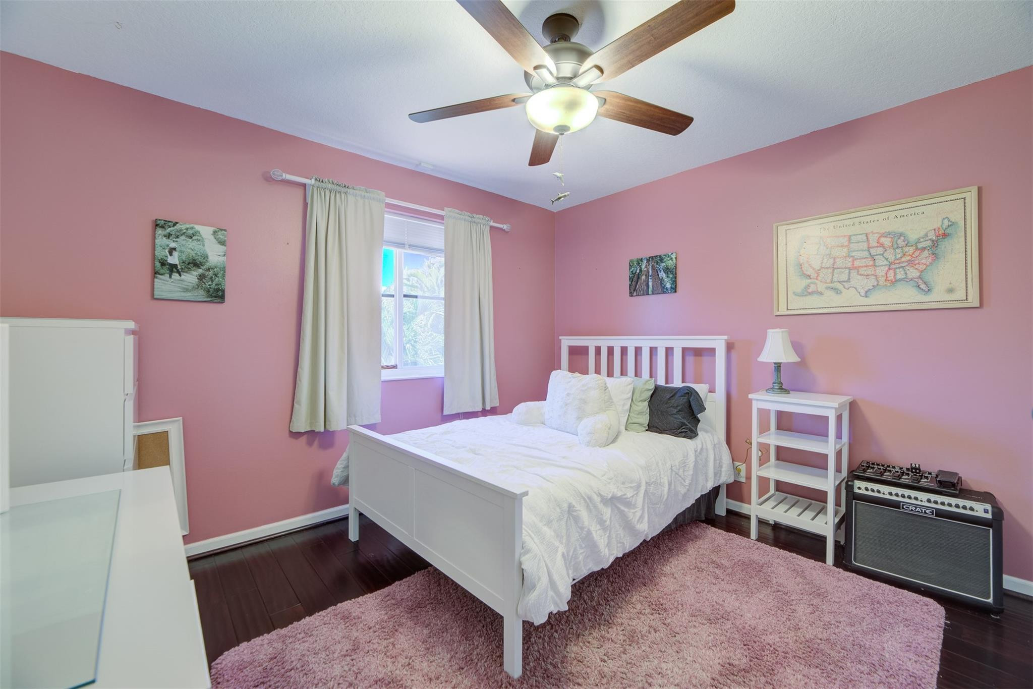 4452 Stone Ridge Way Weston, FL 33331 - Photo 41 of 65 a bedroom with a bed and a chandelier