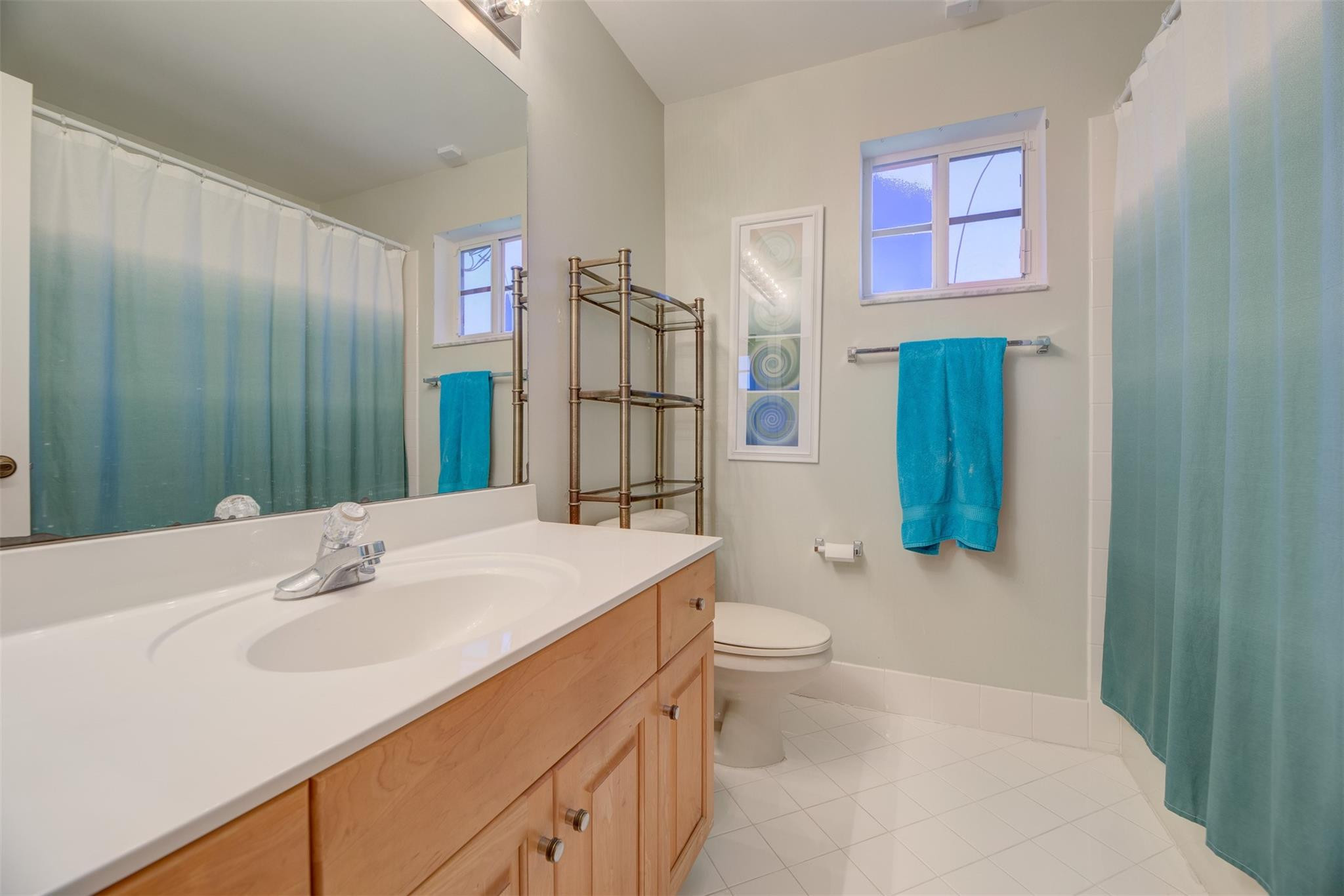 4452 Stone Ridge Way Weston, FL 33331 - Photo 43 of 65 a bathroom with a sink toilet and shower