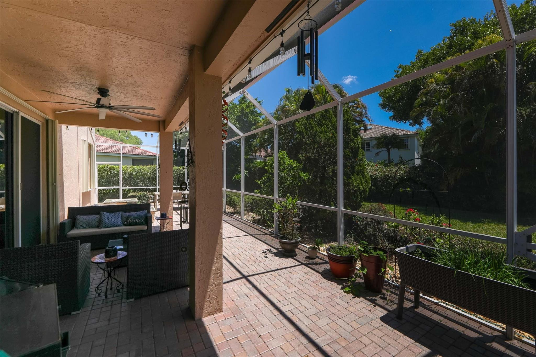 4452 Stone Ridge Way Weston, FL 33331 - Photo 54 of 65 a view of a chairs and table in the balcony