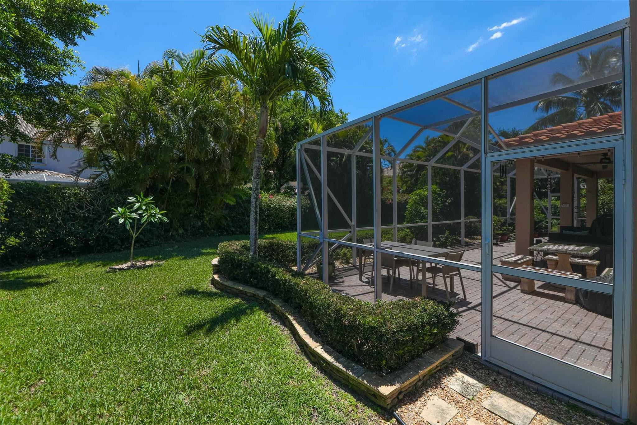 4452 Stone Ridge Way Weston, FL 33331 - Photo 56 of 65 a view of a chairs and tables in the patio