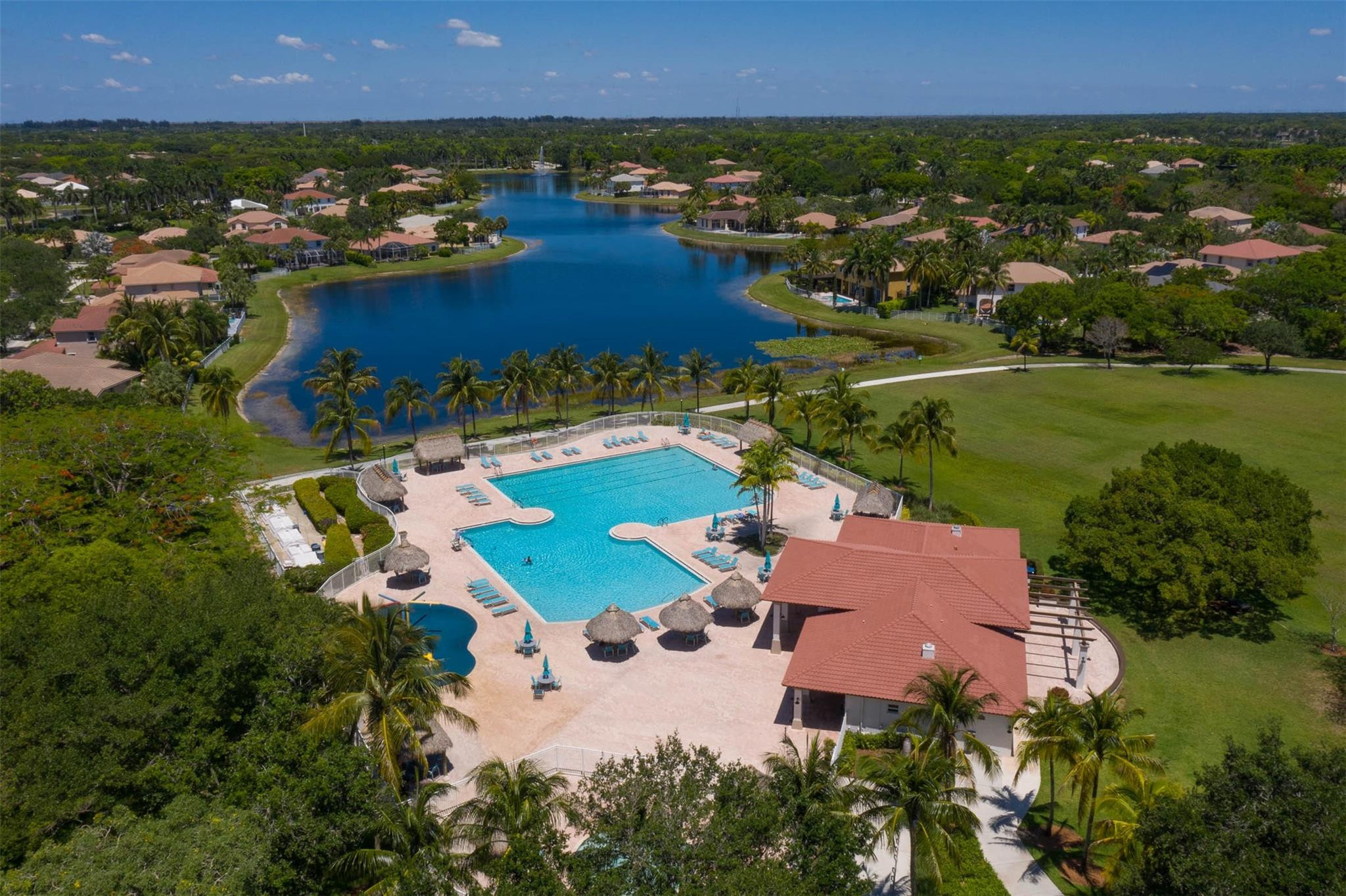 4452 Stone Ridge Way Weston, FL 33331 - Photo 62 of 65 an aerial view of a house with a garden