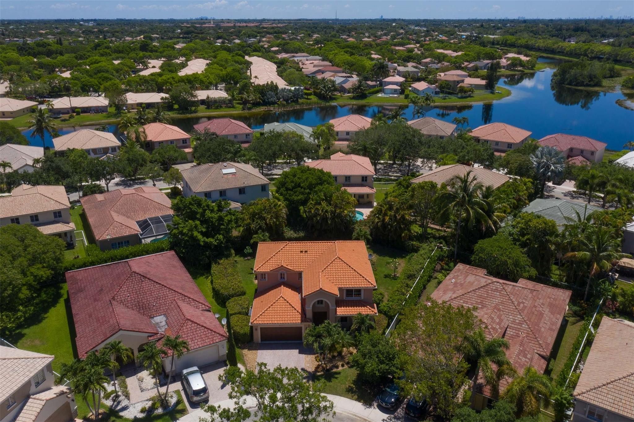 4452 Stone Ridge Way Weston, FL 33331 - Photo 7 of 65 an aerial view of residential houses with outdoor space