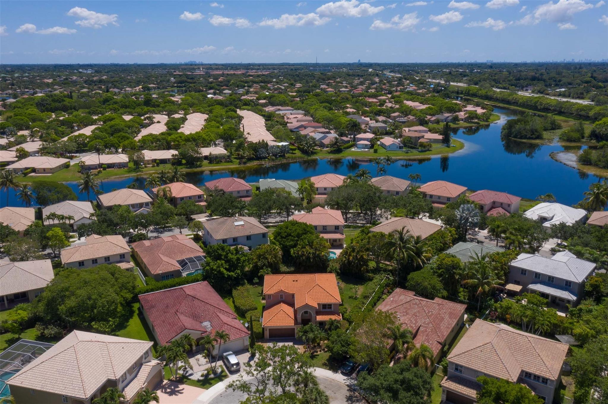 4452 Stone Ridge Way Weston, FL 33331 - Photo 8 of 65 an aerial view of city and lake view