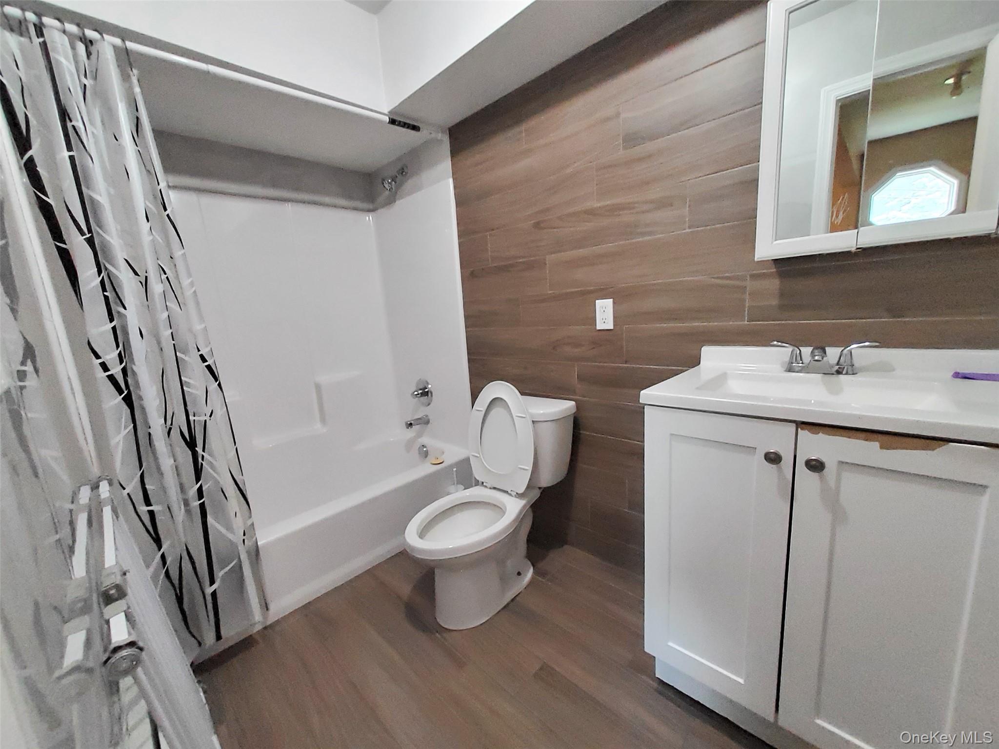 469 Hillside Road Monroe, NY 10950 - Photo 5 of 20 a bathroom with a sink toilet and shower