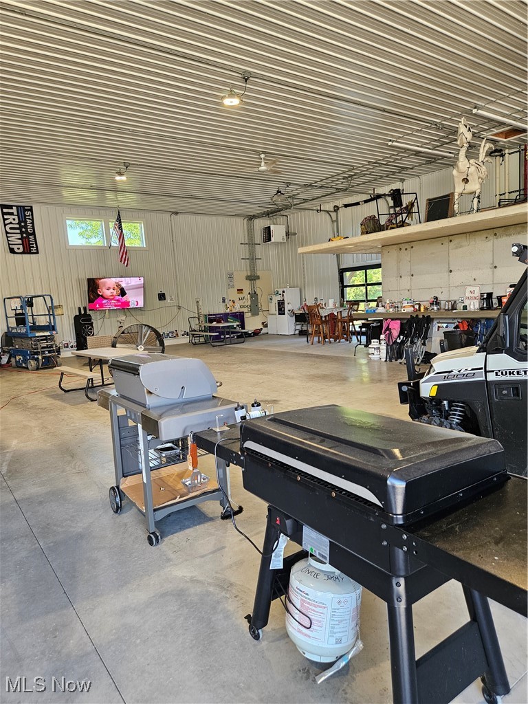 1180 North County Line Road Geneva, OH 44041 - Photo 20 of 33 Garage with a workshop area