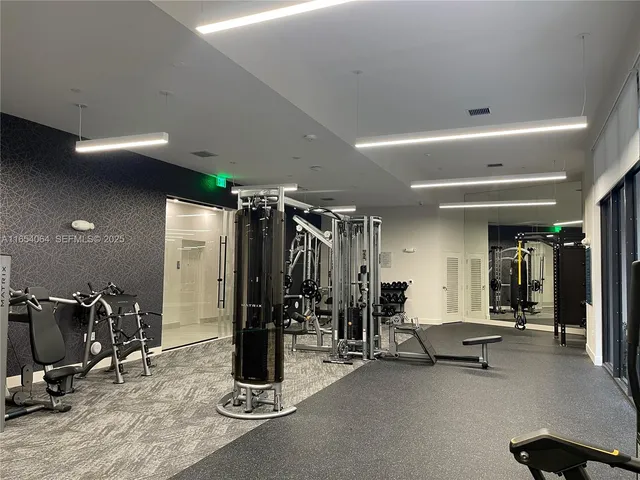a view of a room with gym equipment
