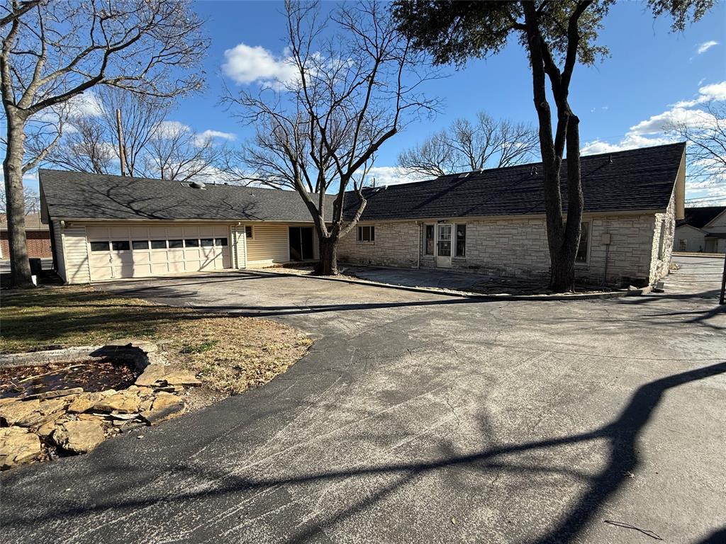 408 West Walnut Street Decatur, TX 76234 - Photo 13 of 14 a front view of a house with a yard