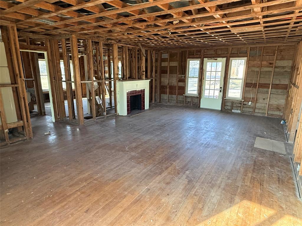 408 West Walnut Street Decatur, TX 76234 - Photo 2 of 14 a view of livingroom with furniture and a fireplace
