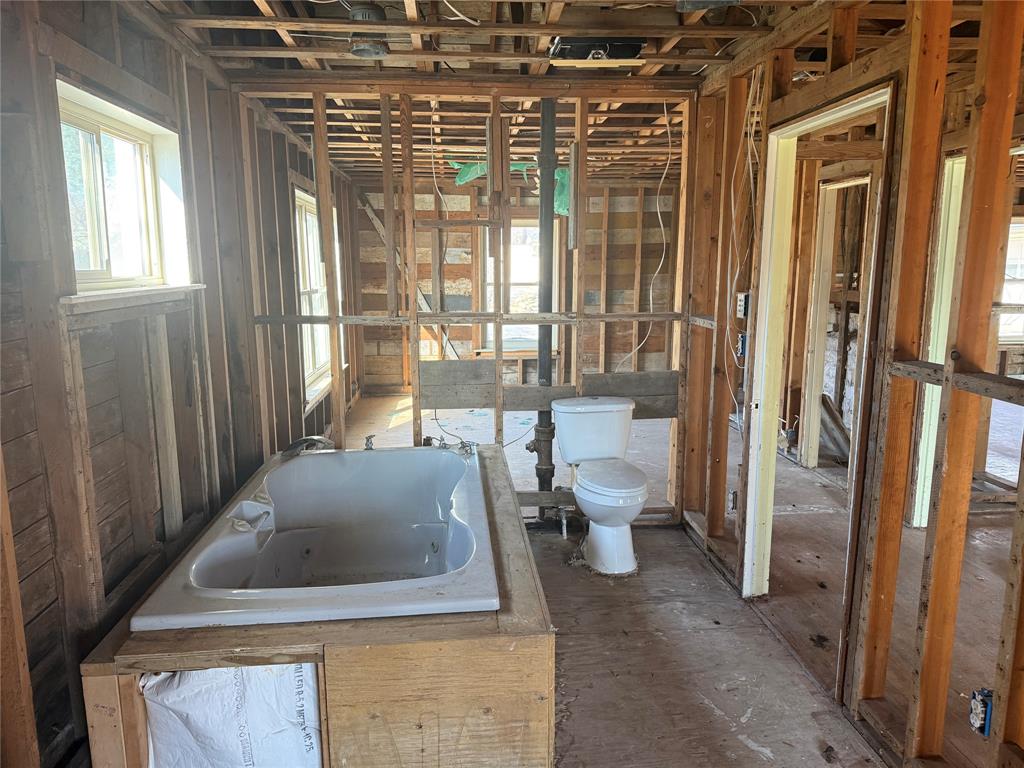 408 West Walnut Street Decatur, TX 76234 - Photo 9 of 14 a living room with furniture and a large window