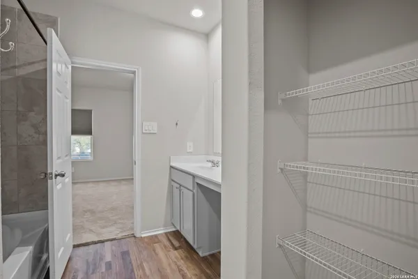 a bathroom with a toilet and a bathtub